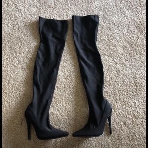 Thigh high black boots